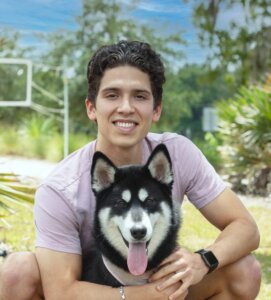 guy smiling with his dog