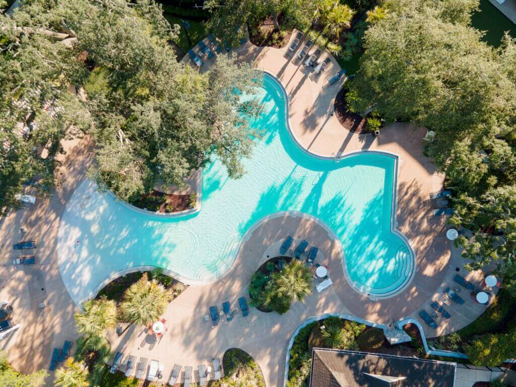 aerial shot of resort style swimming pool in gainesville student apts