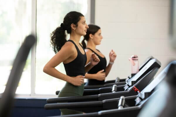 girls running on a treadmill