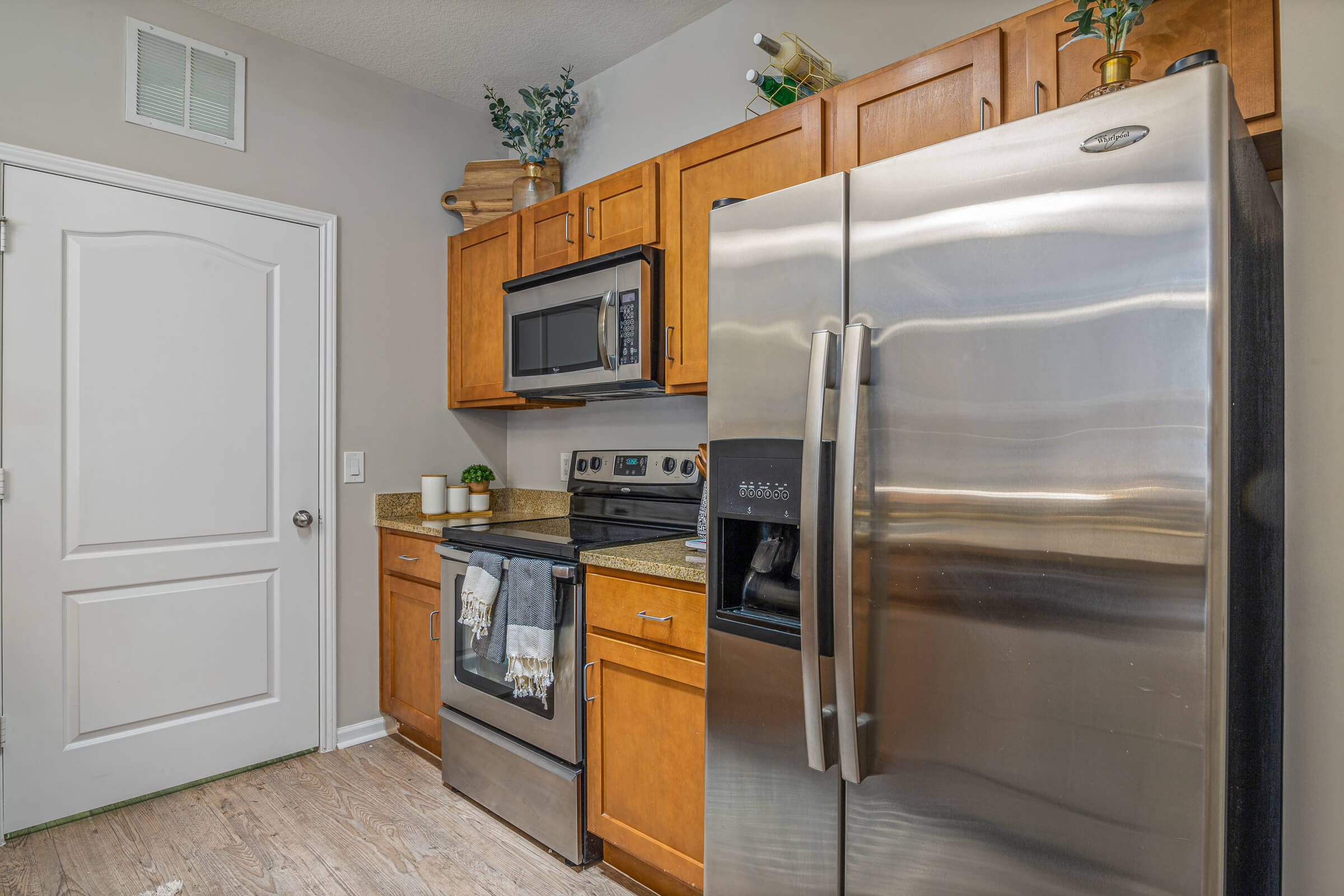 kitchen with stainless steel appliances in gainesville student apartment
